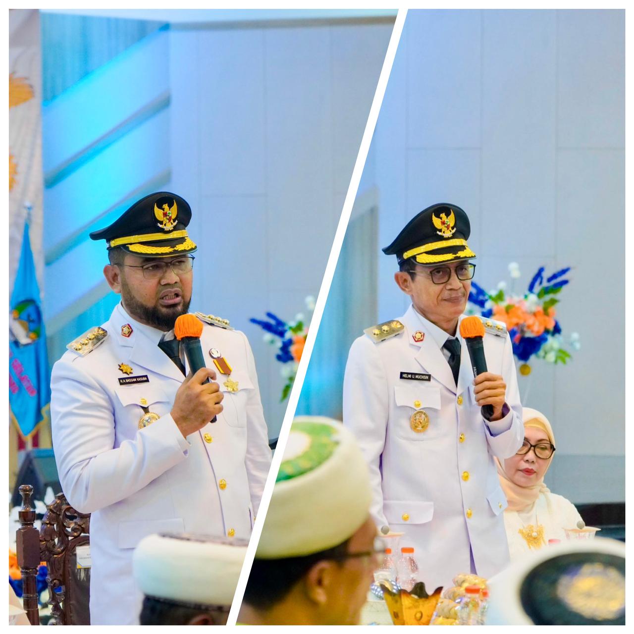 Foto Buapti Bassam Kasuba dan Wakil Bupati Helmi Umar Muhcsin.