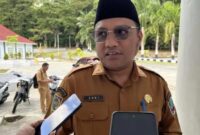 Gambar : Kadis DPMD Halsel.